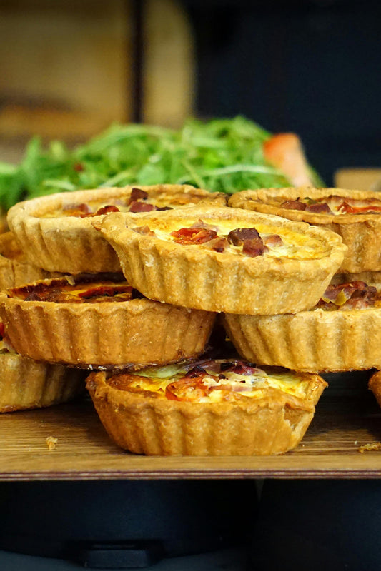 🌿 Mini Quiche con pomodorini gialli e toma di capra